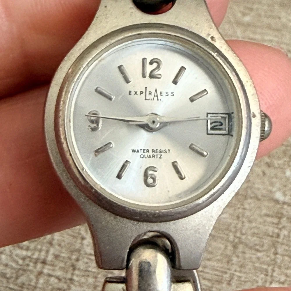 Express LAX1336 Wrist Watch Date Water Resist Silver Tone 7 Inch Womens